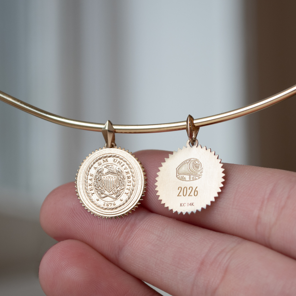 Texas A&M Aggie Ring Crest Pendant shown on Neck Collar with 2026 back engraving in 14k gold