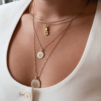 Tennessee Vols Charm shown on figure in gold on Neck Collar, with Tennessee Sunburst Pendant on Cable Chain, and Tennessee Florentine Pendants on Link Chain