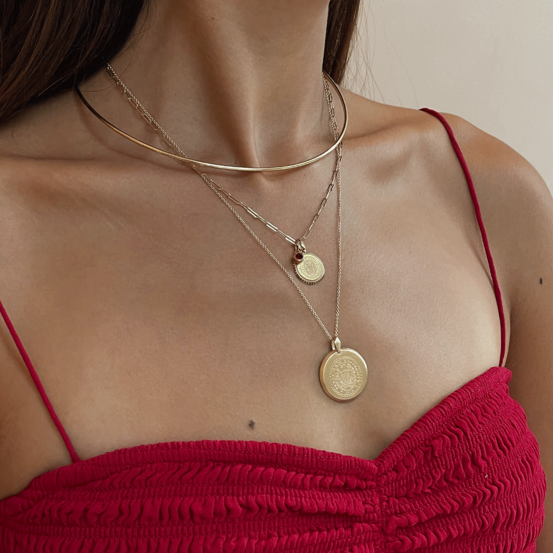 Texas A&M Sunburst Bundle shown on figure in gold with Texas A&M Florentine Pendant in size Large on Cable Chain in gold, with Neck Collar