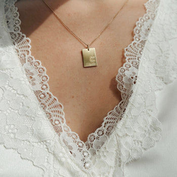 THON "For the Kids" Rectangle Pendant shown on figure in gold on Cable Chain