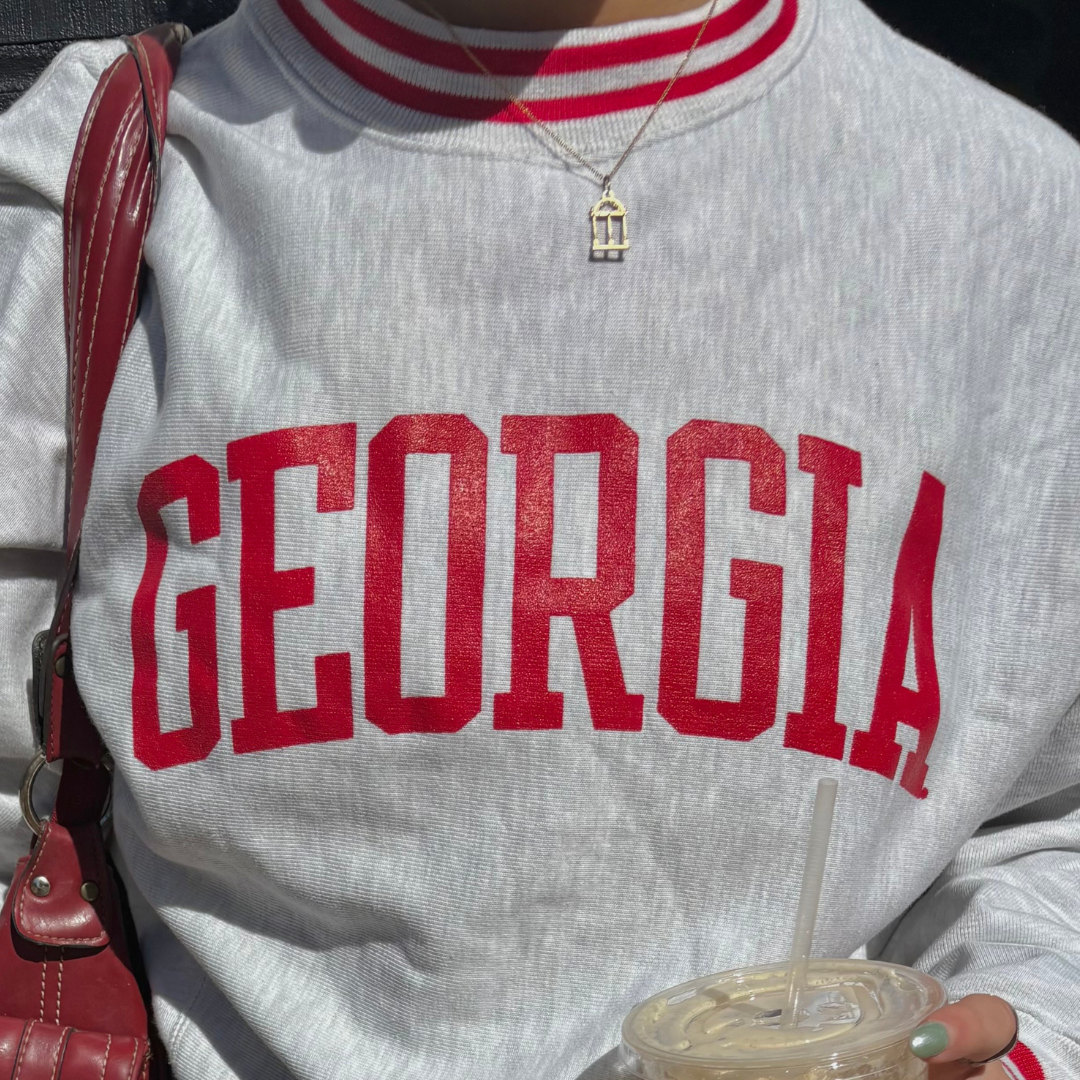 UGA Arch Pendant shown on figure in gold on Cable Chain