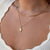 UVA Rotunda Pendant shown on figure in gold on Cable Chain with Neck Collar in gold