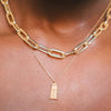 Alabama Denny Chimes Necklace shown on figure in gold with Large Link Chain Choker