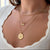 Villanova Church Necklace shown on figure in gold with Neck Collar and Villanova Large Florentine Pendant on Link Chain