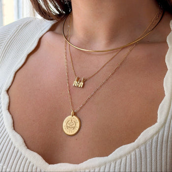 Villanova Church Necklace shown on figure in gold with Neck Collar and Villanova Large Florentine Pendant on Link Chain