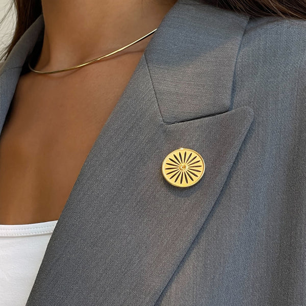 Wisconsin Union Lapel Pin shown on figure in gold