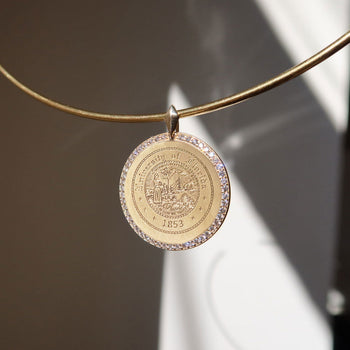 Florida Seal Diamond Florentine Pendant shown on Neck Collar in gold