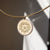 Michigan Diamond Florentine Pendant shown on figure in gold on Neck Collar