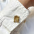 Ohio State Rotunda Cufflink shown on figure in gold